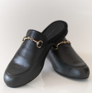 Black mule gold buckle